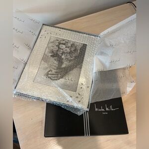 Nicole Miller Elegant Silver Frame